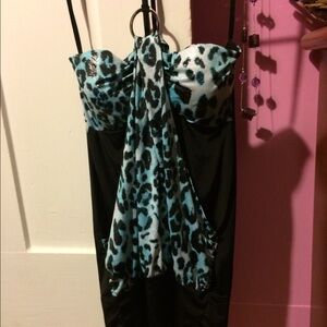 Light blue, white, and black sparkly cheetah top